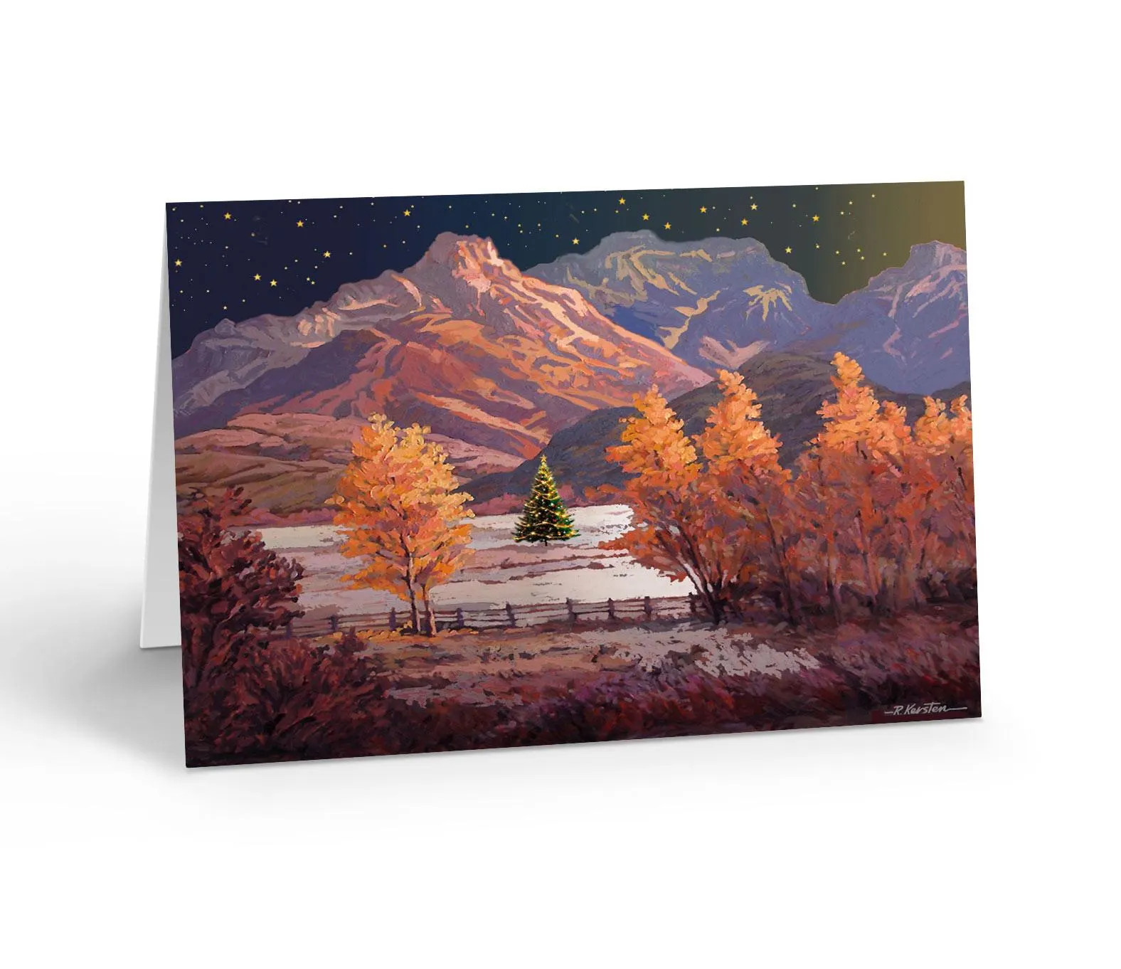 A Cute Little Christmas Tree Among the Mountains on a Fall Night – 18 Holiday Ca